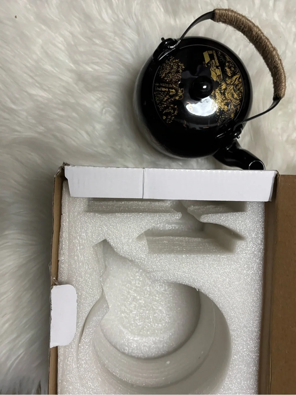 Black and Gold Ceramic Teapot with Woven Handle